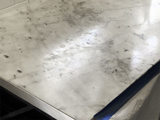 Etched Marble Countertop Refinished to a Honed Look - Santa Fe Floor Care